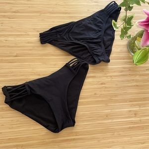 Two pack black bathing suit bottom size XS/S straps on the sides